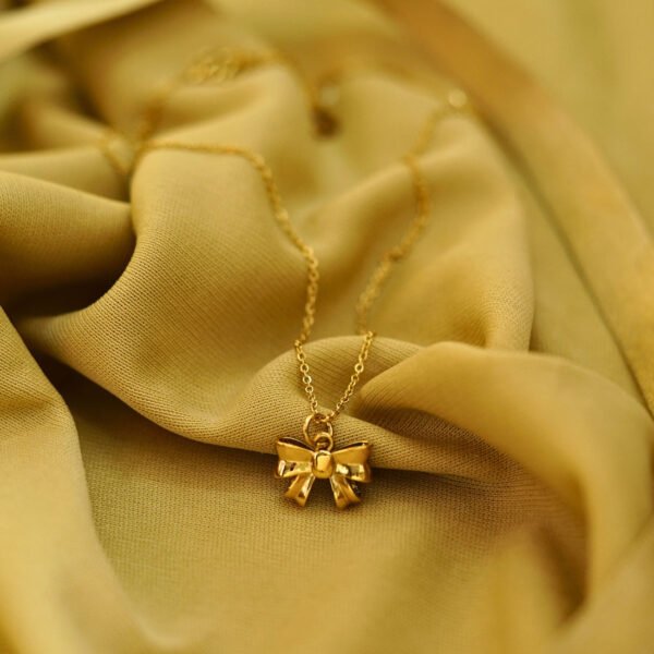 Elegant Gold Bow Pendant Necklace - Alinora Jewels - Image 2