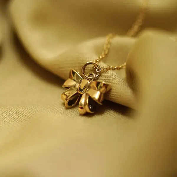 18k gold plated bow charm pendant